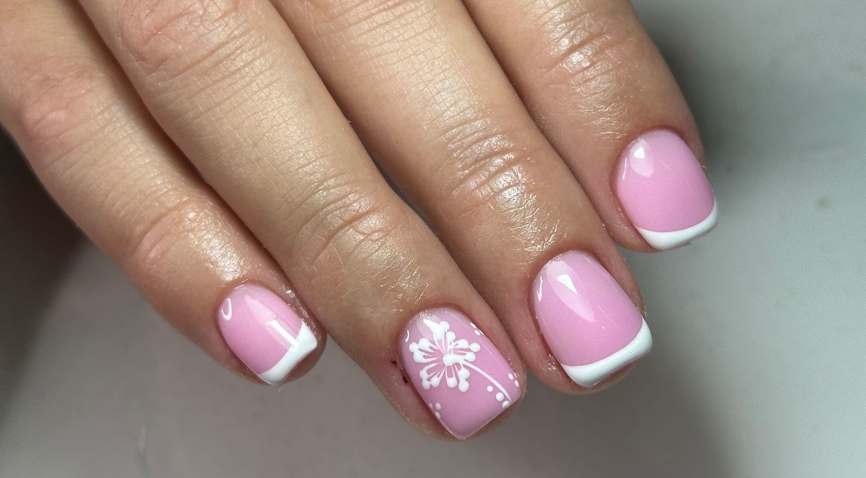 Elegant pink nails with floral design at LKR Beauty, Wigan, England, GB.