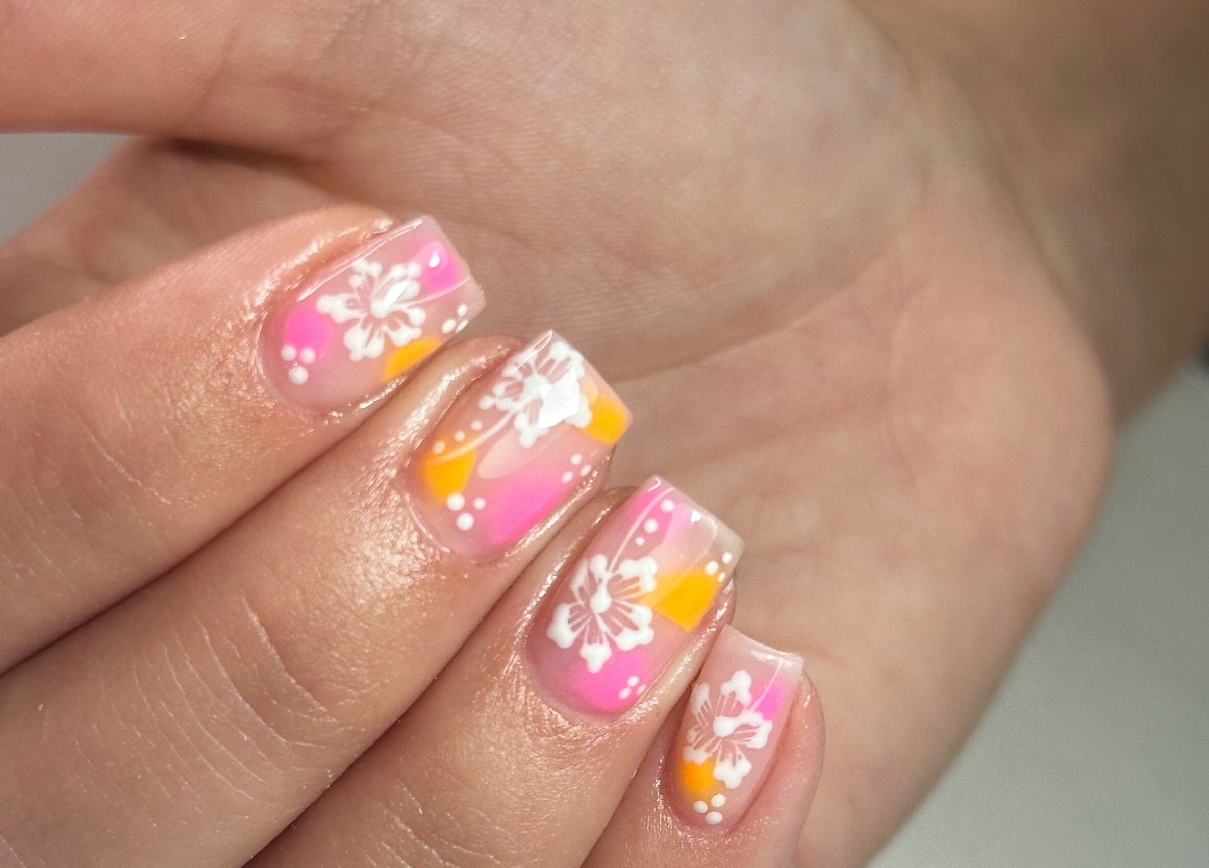 Floral nail art with pastel colors at LKR Beauty, Wigan, England, GB. Perfect for vibrant, chic nails.