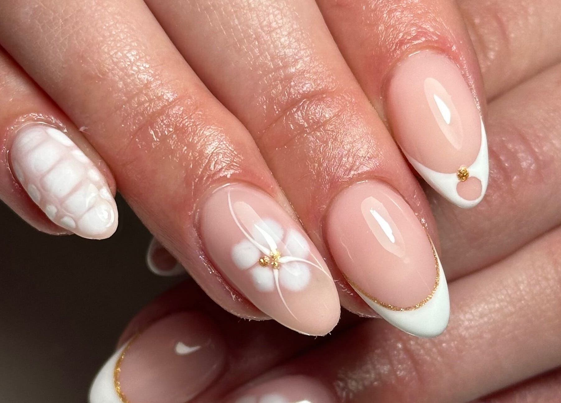 Stylish nail art with floral design at LKR Beauty, Wigan, England, GB. Perfect blend of elegance and artistry.