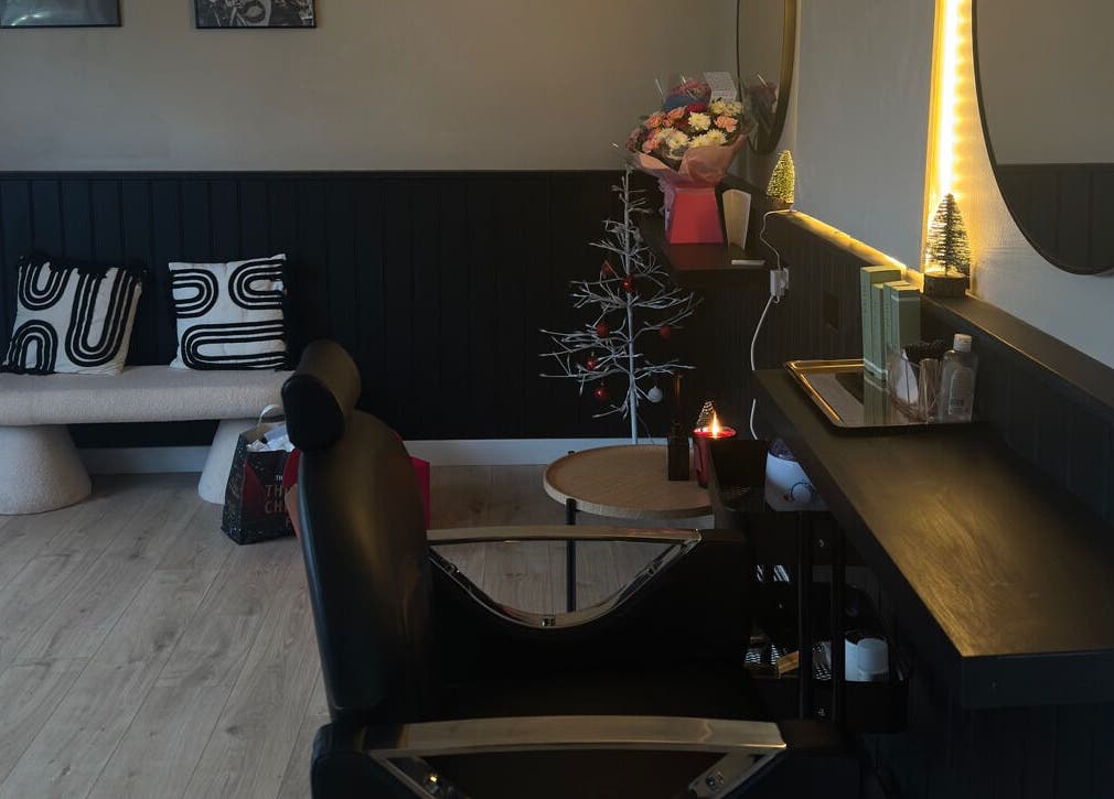 Elegant interior of LM Beauty Co & Lashes in Edinburgh, Scotland, GB featuring modern decor and cozy seating.