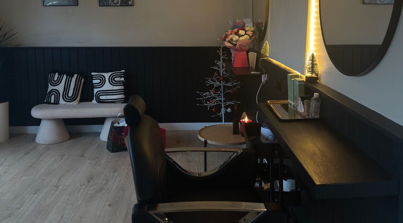 Elegant interior of LM Beauty Co & Lashes in Edinburgh, Scotland, GB featuring modern decor and cozy seating.