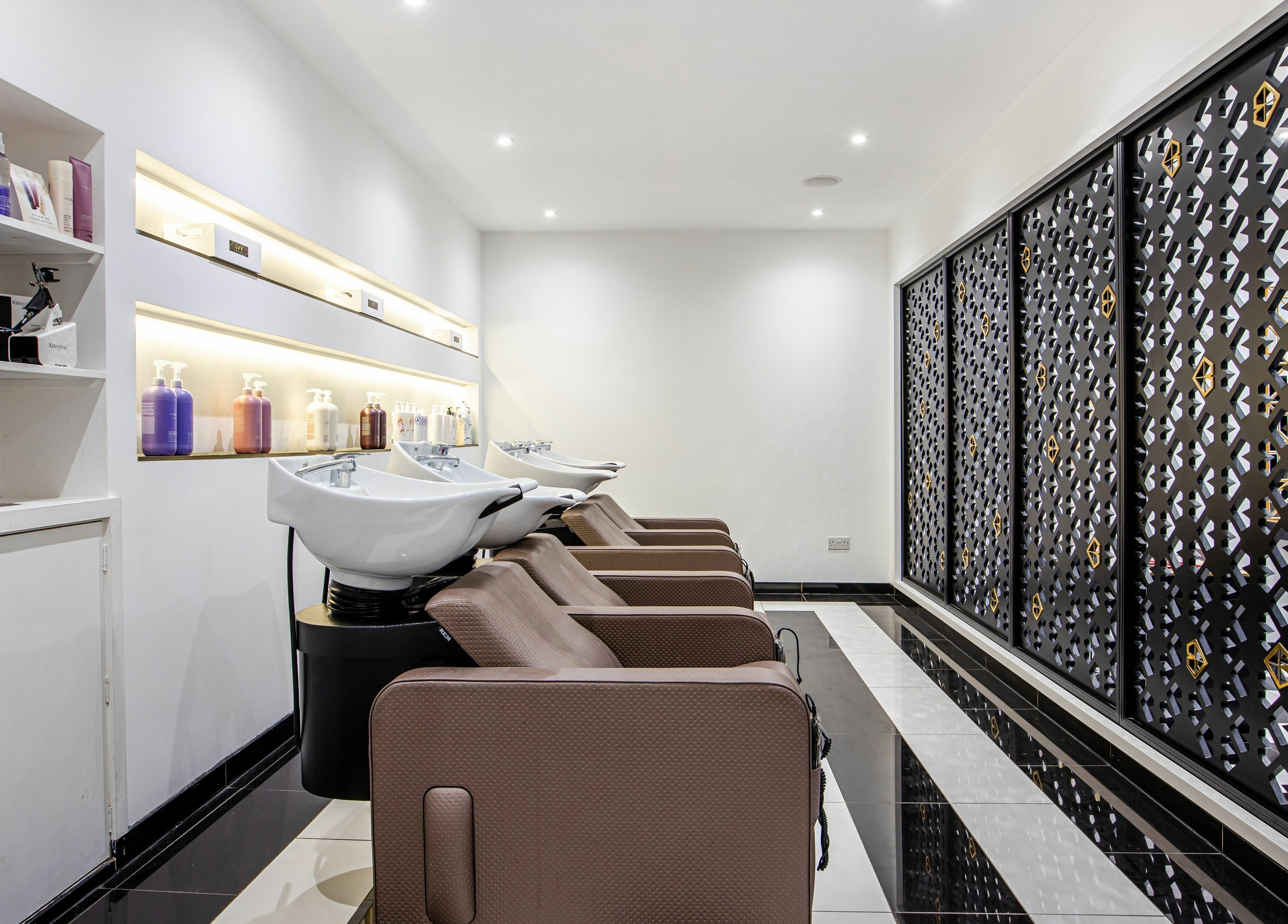 Elegant hair wash area at The Ivy Salon, Torquay, England, GB with modern design and stylish decor.