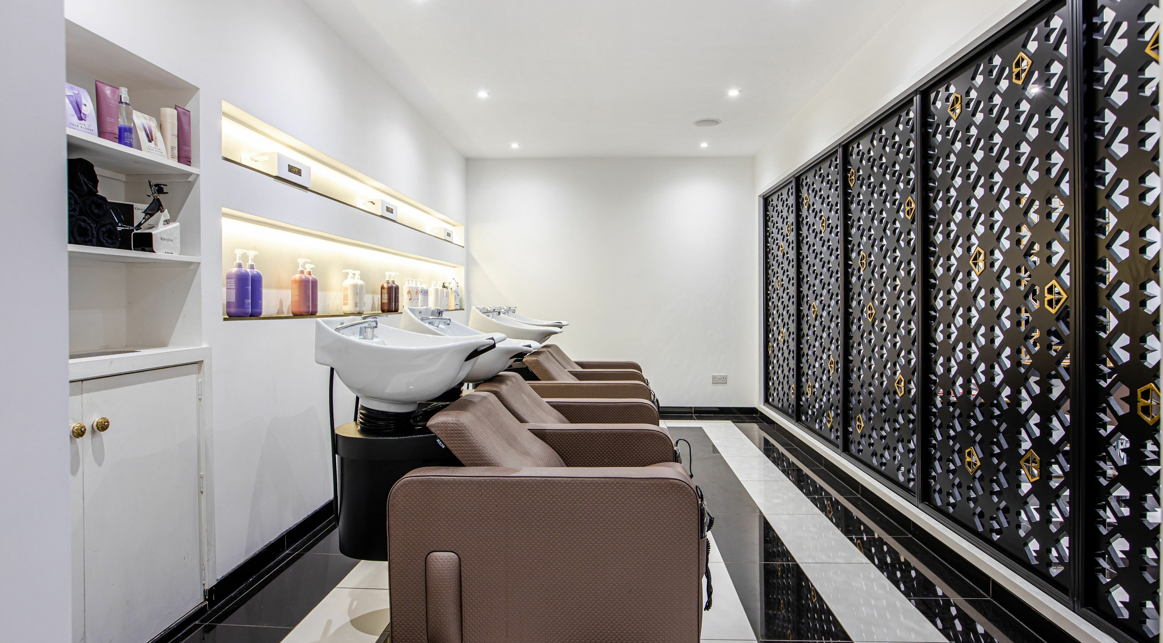 Elegant hair wash area at The Ivy Salon, Torquay, England, GB with modern design and stylish decor.