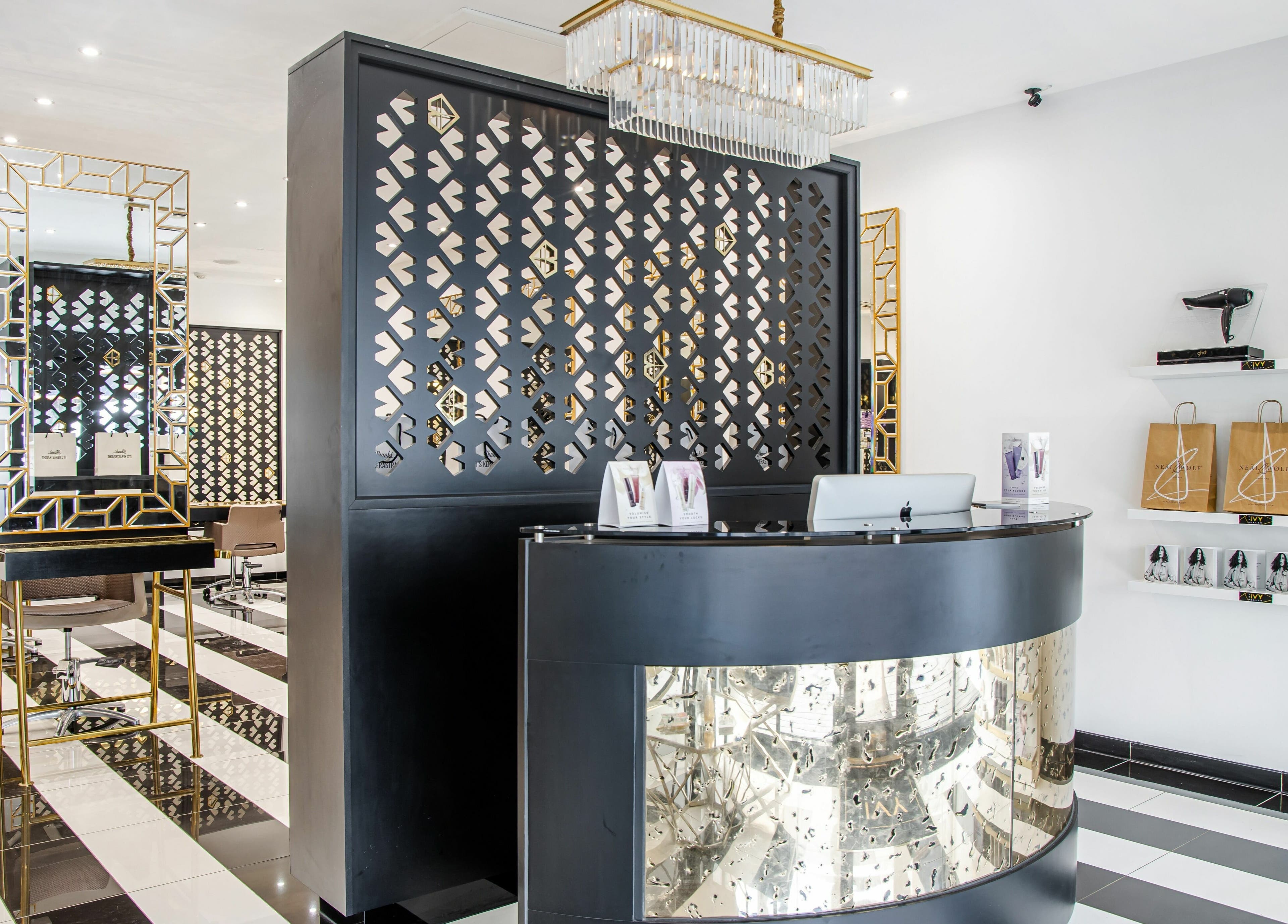 Luxurious interior of The Ivy Salon, Torquay, England, GB with elegant decor and stylish seating.