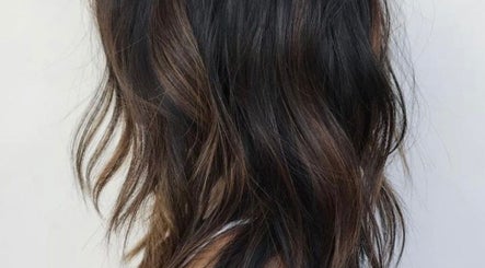 Elegant brown hair waves styled at Hair Artistry Studio, Camden, New South Wales, AU.