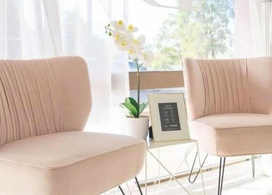Stylish waiting area at Alpha Laser Clinics | Batlow, Batlow, New South Wales, AU featuring modern chairs.