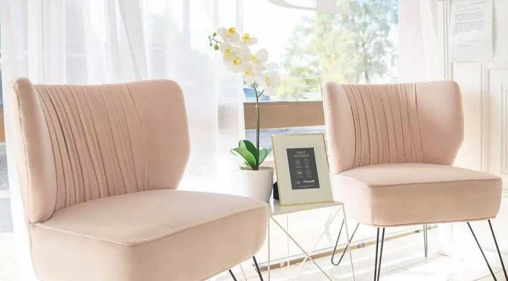 Stylish waiting area at Alpha Laser Clinics | Batlow, Batlow, New South Wales, AU featuring modern chairs.