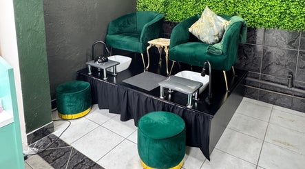Elegant pedicure chairs at Myrakia Beauty & Laser Bar, Benoni, Gauteng, ZA, set against lush greenery.