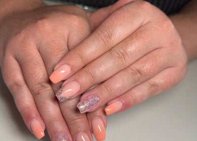Elegant glitter-accented nails at Myrakia Beauty & Laser Bar, Benoni, Gauteng, ZA, showcasing premium manicure.