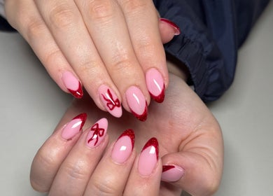 Stylish red-tipped nails at Myrakia Beauty & Laser Bar in Benoni, Gauteng, ZA.