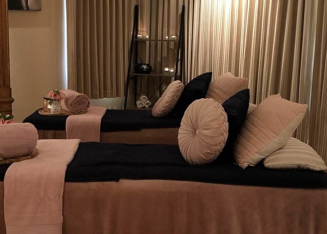 Cozy spa treatment room at Brookleigh Beauty and Spa, Upper Swan, Western Australia, AU, showcasing plush towels.