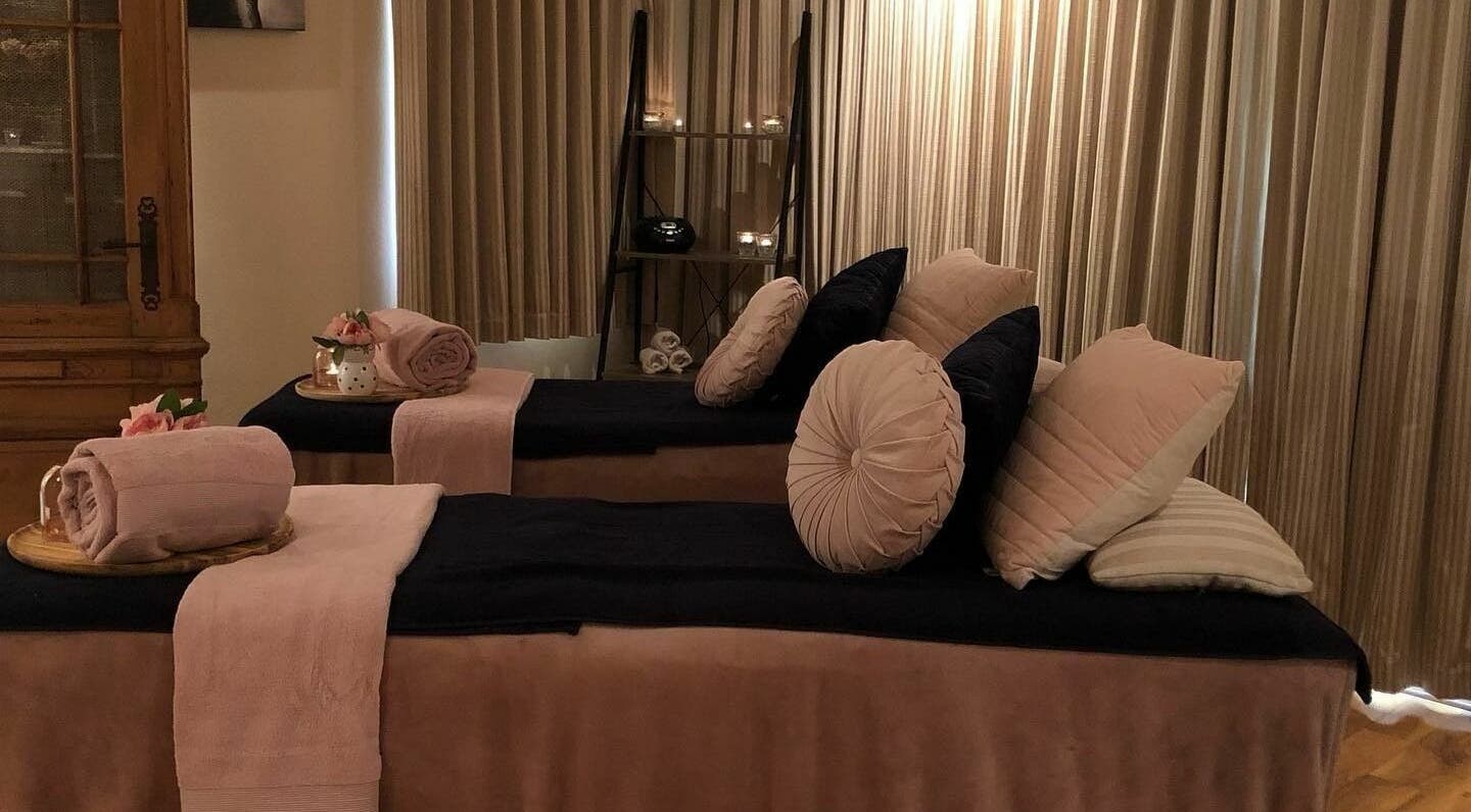 Cozy spa treatment room at Brookleigh Beauty and Spa, Upper Swan, Western Australia, AU, showcasing plush towels.