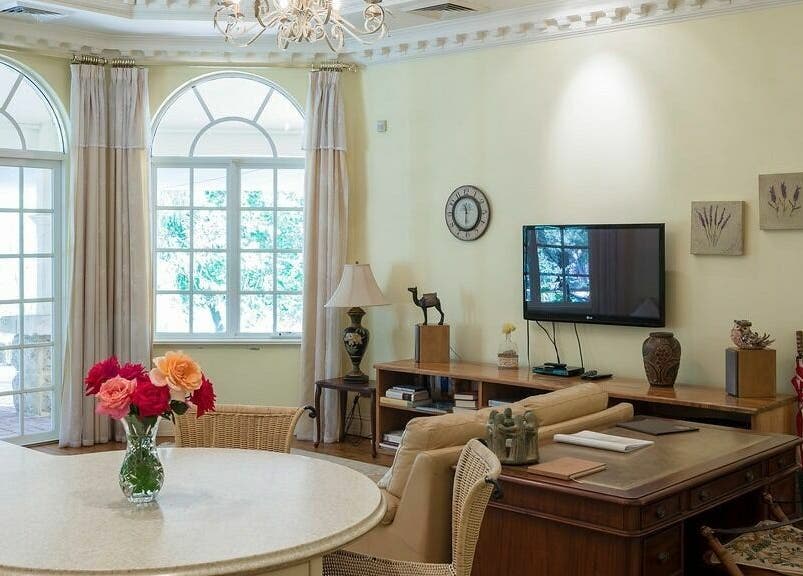 Chic lounge area at Brookleigh Beauty and Spa, Upper Swan, Western Australia, AU with elegant decor and bright windows.
