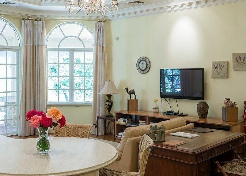 Chic lounge area at Brookleigh Beauty and Spa, Upper Swan, Western Australia, AU with elegant decor and bright windows.