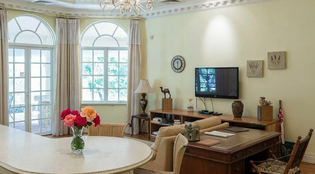 Chic lounge area at Brookleigh Beauty and Spa, Upper Swan, Western Australia, AU with elegant decor and bright windows.