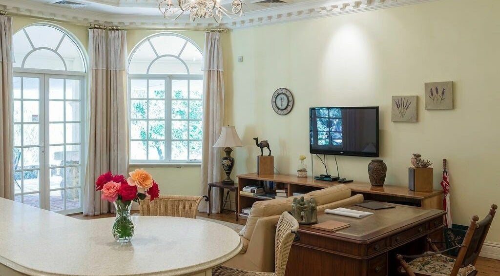 Chic lounge area at Brookleigh Beauty and Spa, Upper Swan, Western Australia, AU with elegant decor and bright windows.
