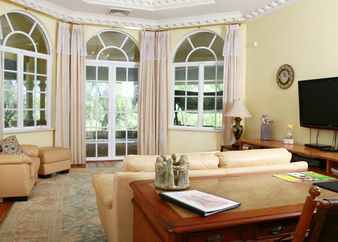 Elegant lounge at Brookleigh Beauty and Spa, Upper Swan, Western Australia, AU with comfortable seating.