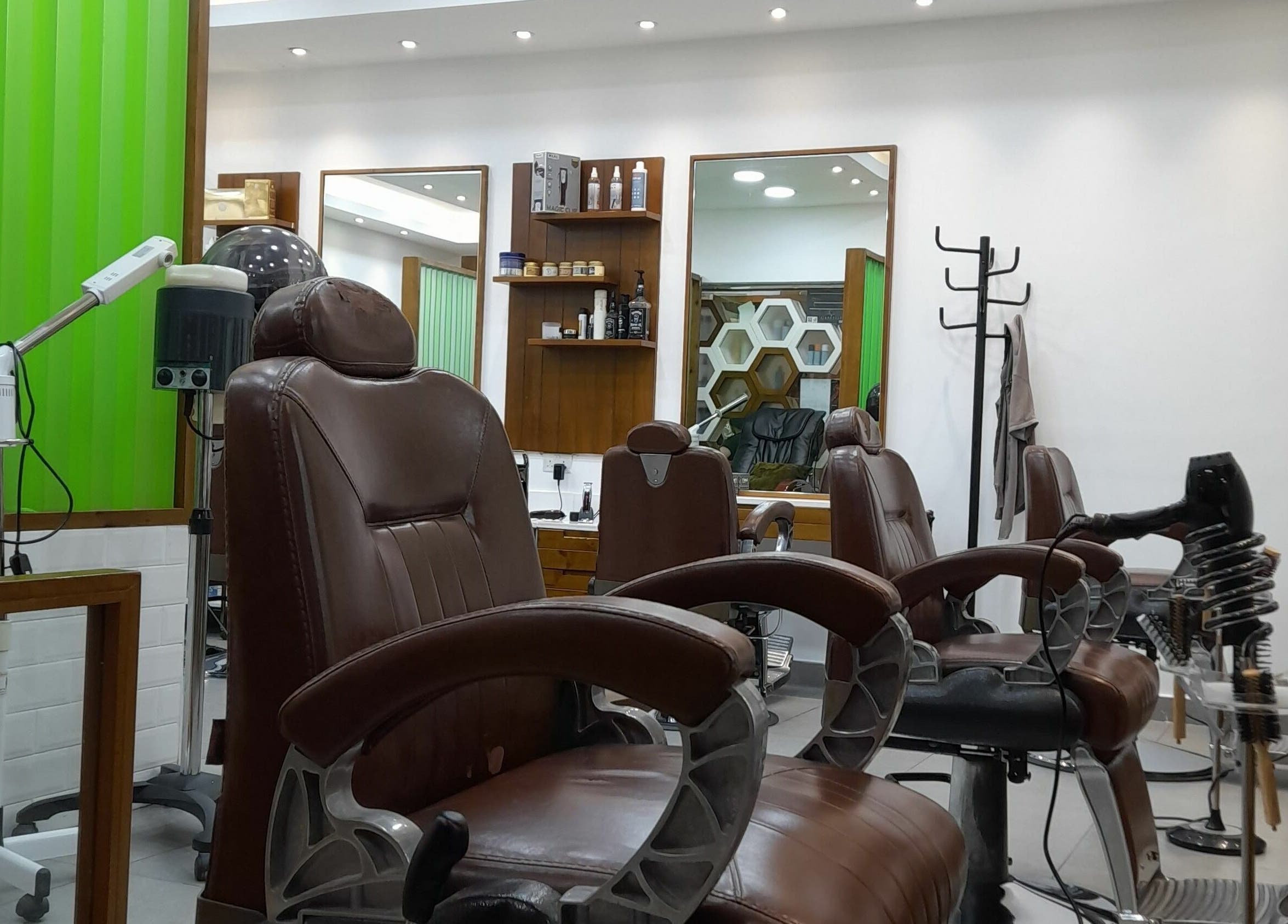 Luxurious styling chairs at Caractere Salon Mall of the Emirates, Dubai, AE enhance the modern salon ambiance.