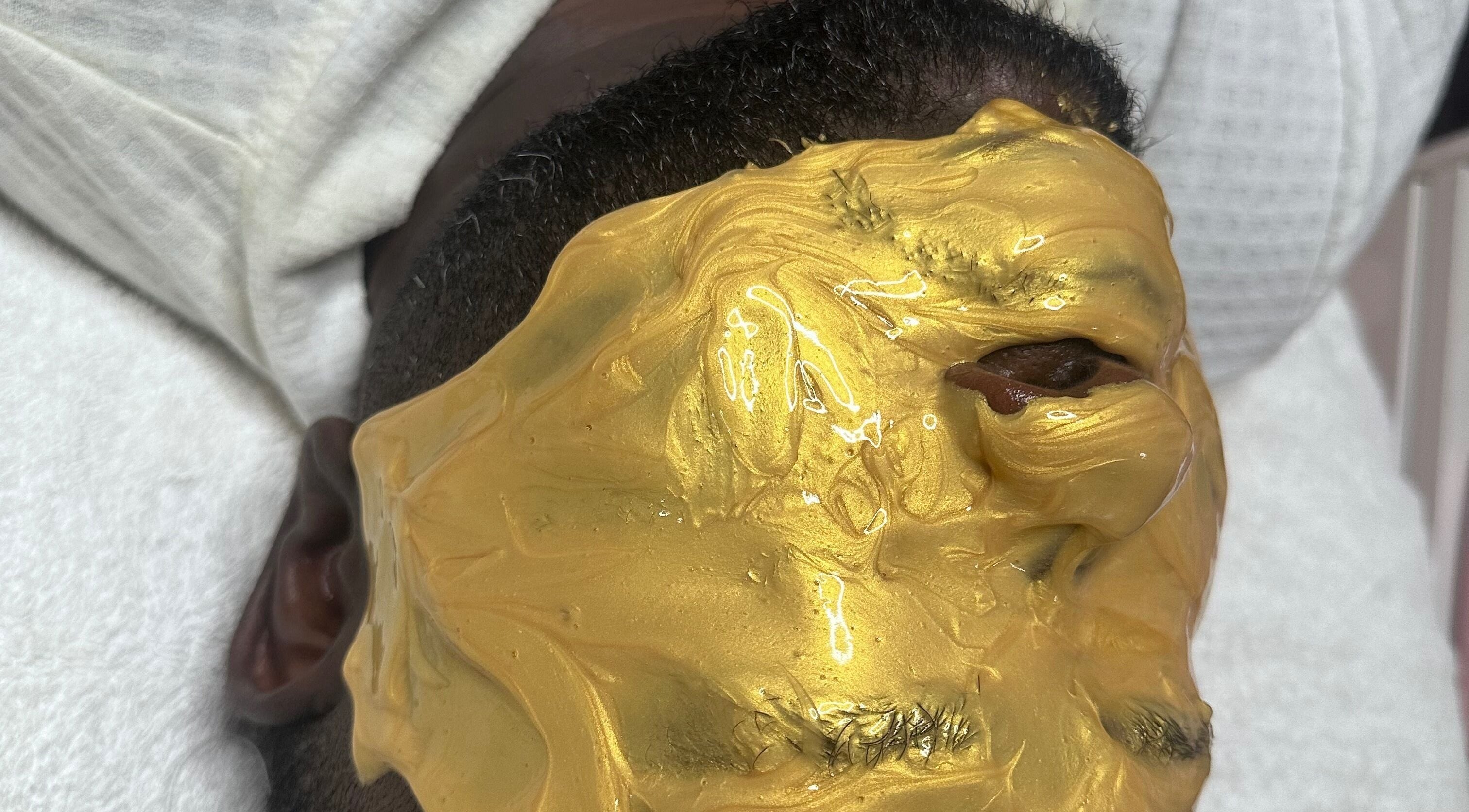 Relaxing golden facial mask applied at CBL New York Location, Albany, New York, US for ultimate skincare.