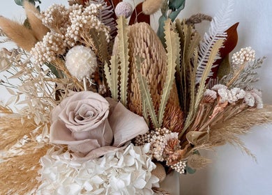 Stunning floral arrangement at Enhanced Beauty, Westport, West Coast, NZ featuring dried and fresh blooms.