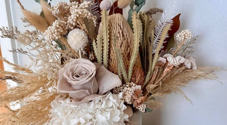 Stunning floral arrangement at Enhanced Beauty, Westport, West Coast, NZ featuring dried and fresh blooms.