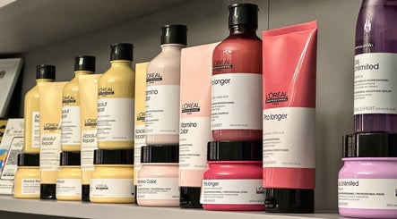Premium hair care products on display at Fetouna Women Salon, Dubai, AE. Shelf stocked with L'Oreal items.