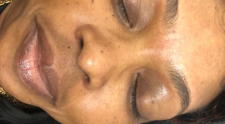 Close-up of a serene, freshly treated face at Feminine Chemistry in Portmore, St. Catherine Parish, JM.