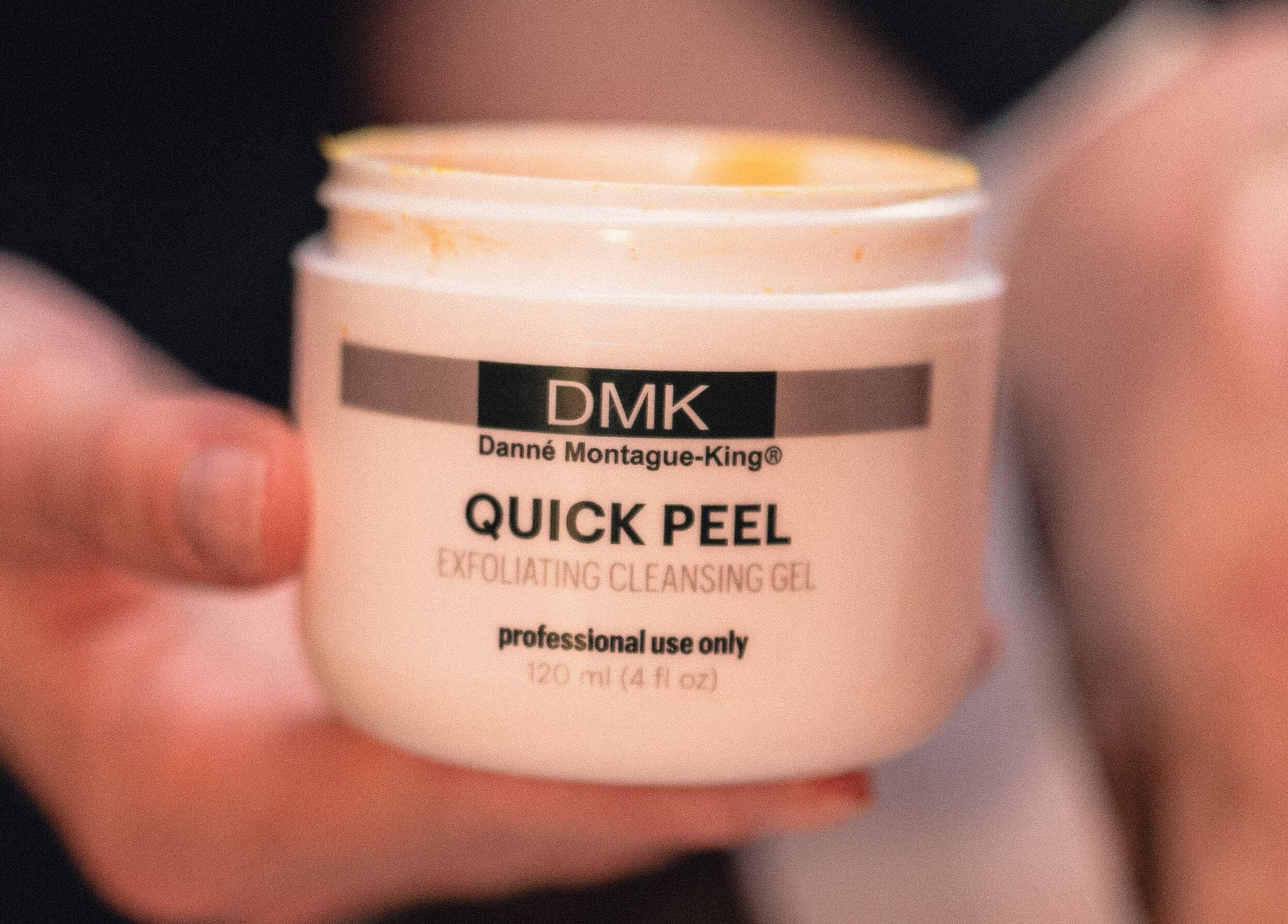DMK Quick Peel product in hand at Skinmethods, West Warwick, Rhode Island, US.