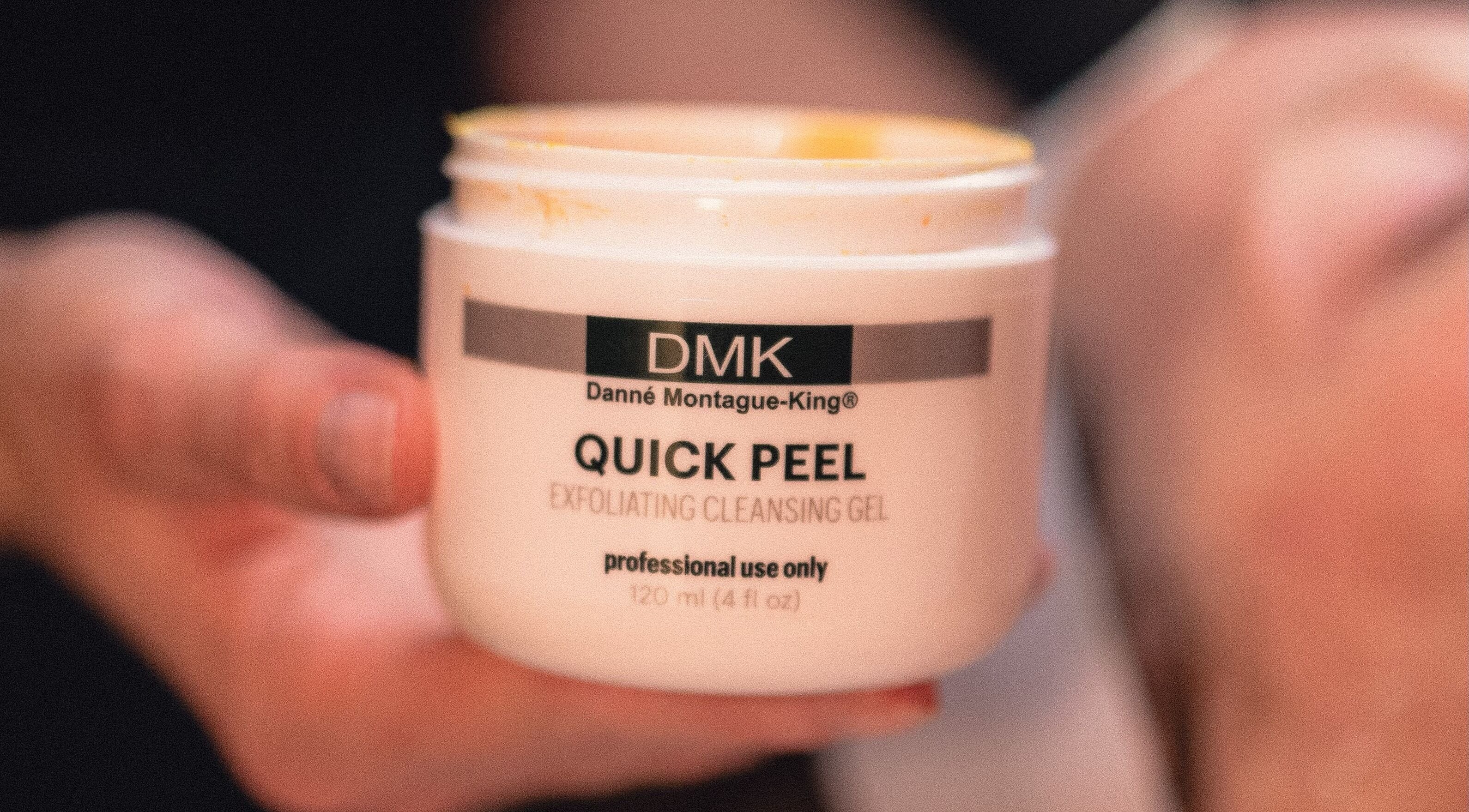 DMK Quick Peel product in hand at Skinmethods, West Warwick, Rhode Island, US.