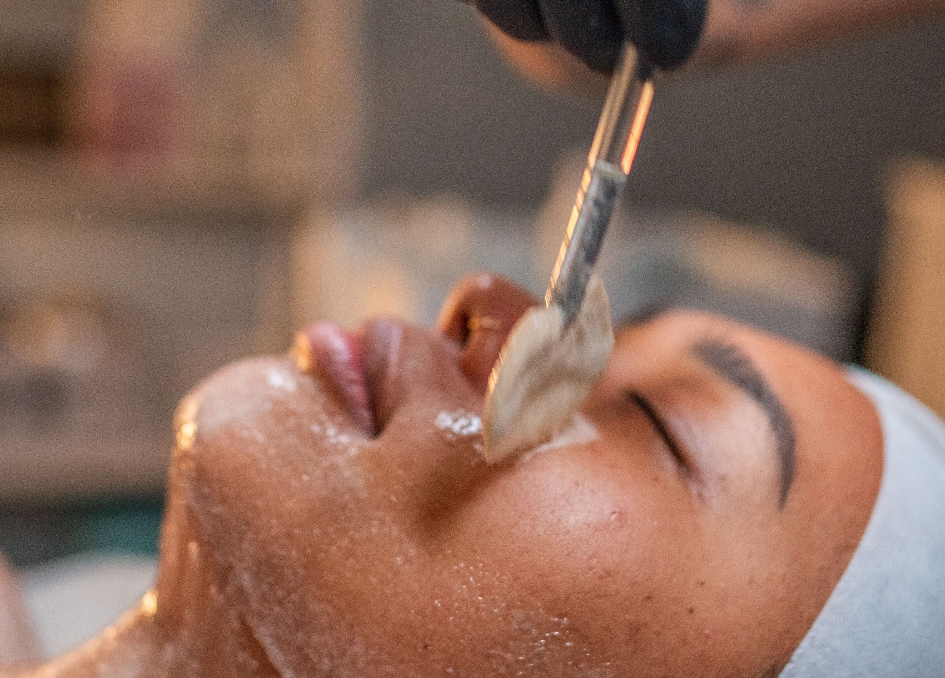 Facial treatment in progress at Skinmethods, West Warwick, Rhode Island, US, showcasing expert skincare techniques.