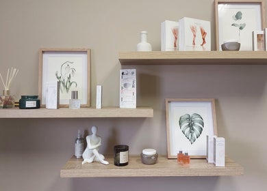 Stylish beauty products on wooden shelves at Nails by Anja, Windhoek, Khomas Region, NA.
