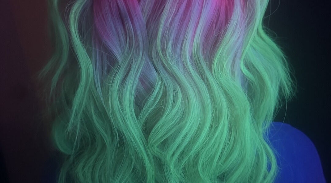 Vibrant multicolor waves glowing under light at KTF Self Care Studio, Cardiff, Wales, GB.