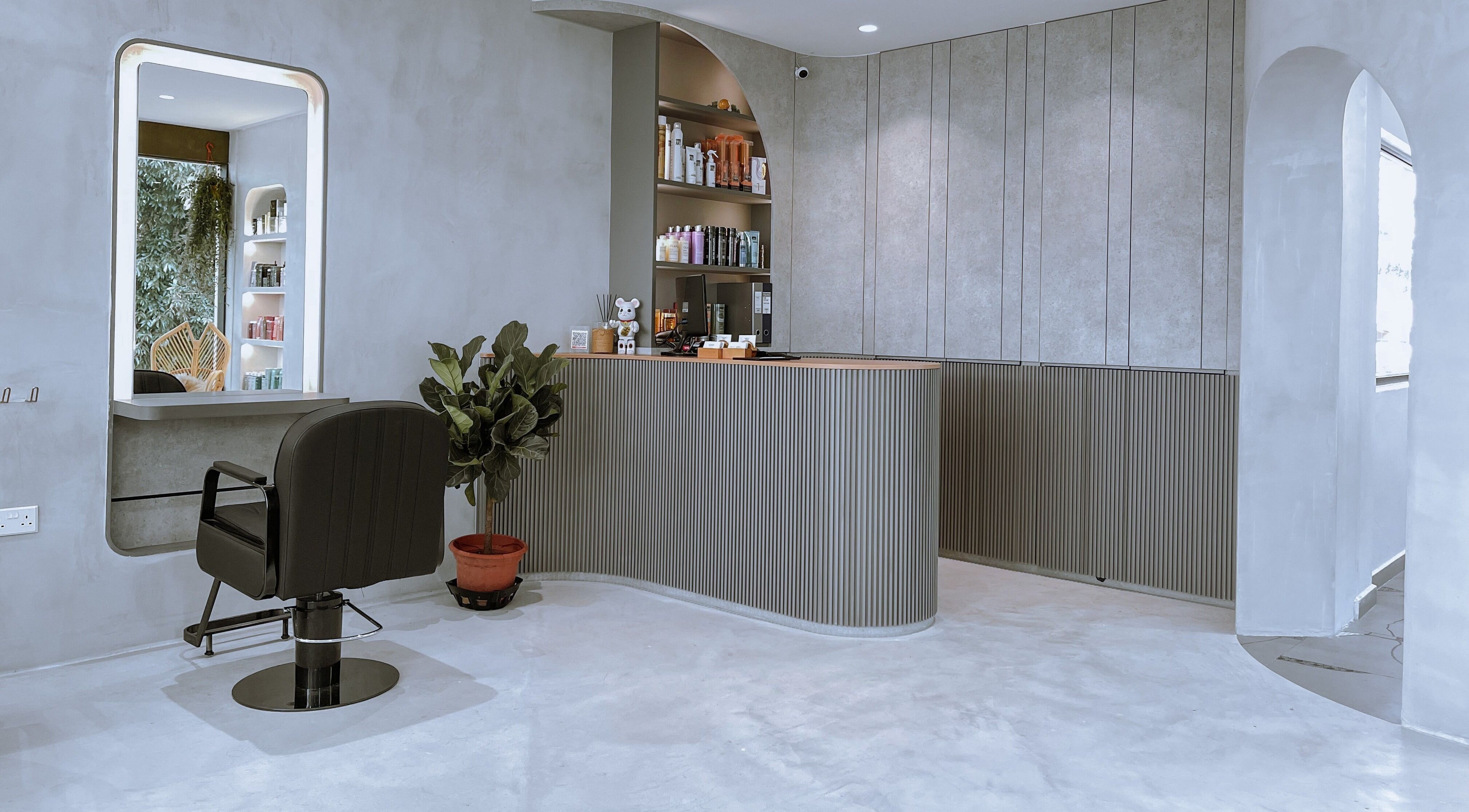 Modern styling chair and reception at The Hair Lounge, Singapore, Singapore, SG.