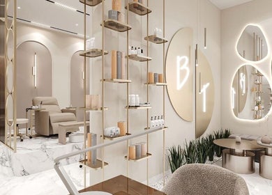 Luxurious Beauty Trend Salon interior in Dubai, AE with elegant decor and plush seating for relaxation.