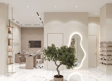 Inside Beauty Trend Salon, Dubai. Modern design with greenery, elegant decor, and cosmetic displays.