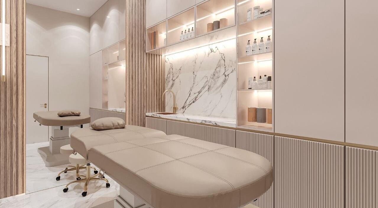 Luxurious treatment room at Beauty Trend Salon in Dubai, AE with plush beds and elegant decor.