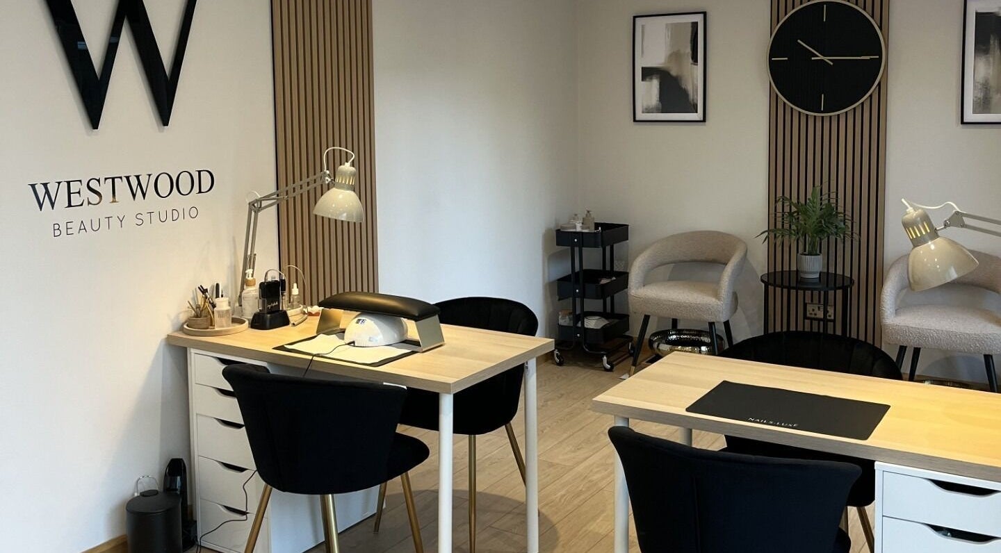 Interior of Westwood Beauty Studio in Wetherby, England, GB showcasing modern decor and stylish workstations.