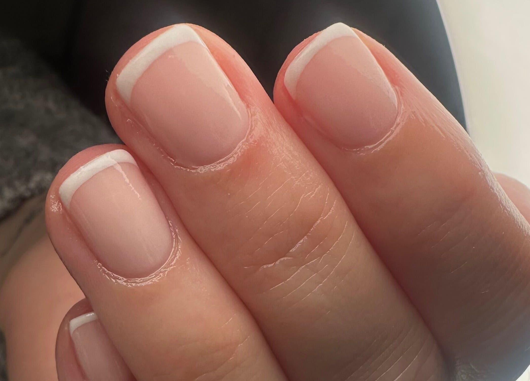 Elegant French manicure at St Neots Nail Fairy in St Neots, England, GB; showcasing expert nail art design.
