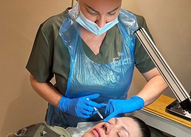 Eden Salon professional providing facial treatment in Tyldesley, England, GB.
