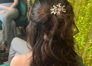 Stylish updo with hairpiece at Eden Salon, Tyldesley, England, GB.