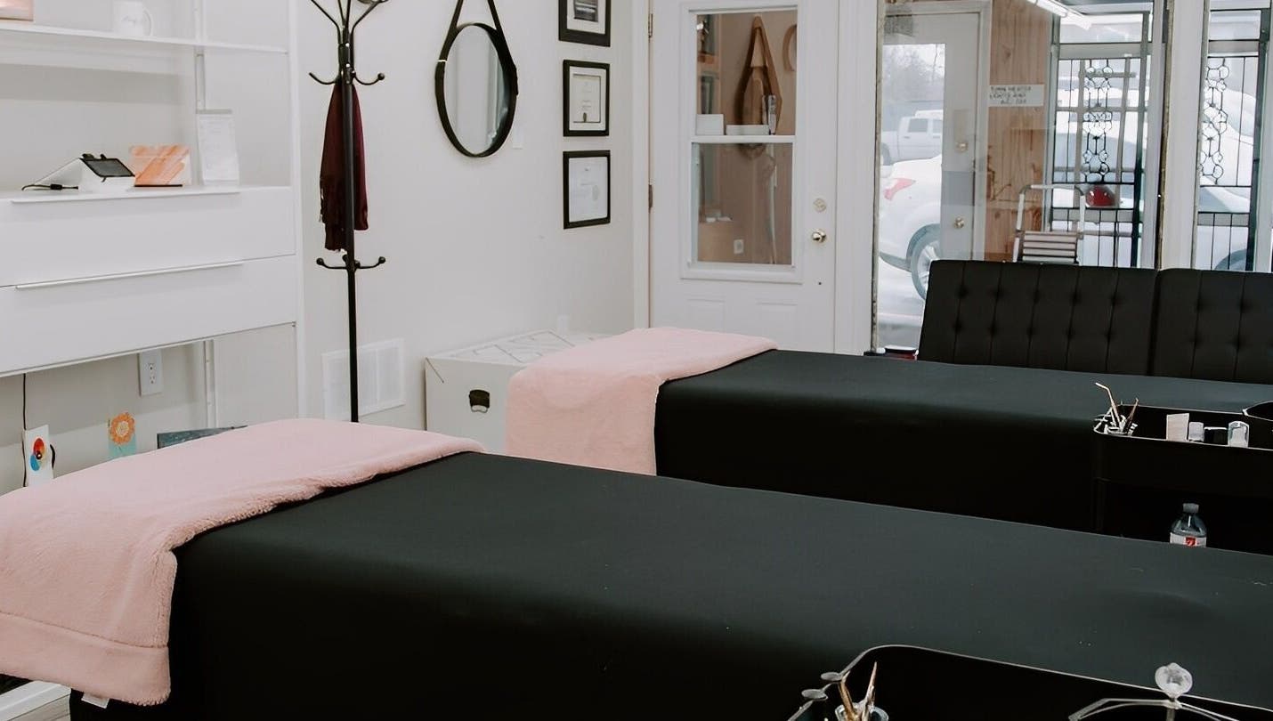 Elegant treatment room at Strathroy - Sweet as Sugar, featuring two massage tables. Strathroy, Ontario, CA.