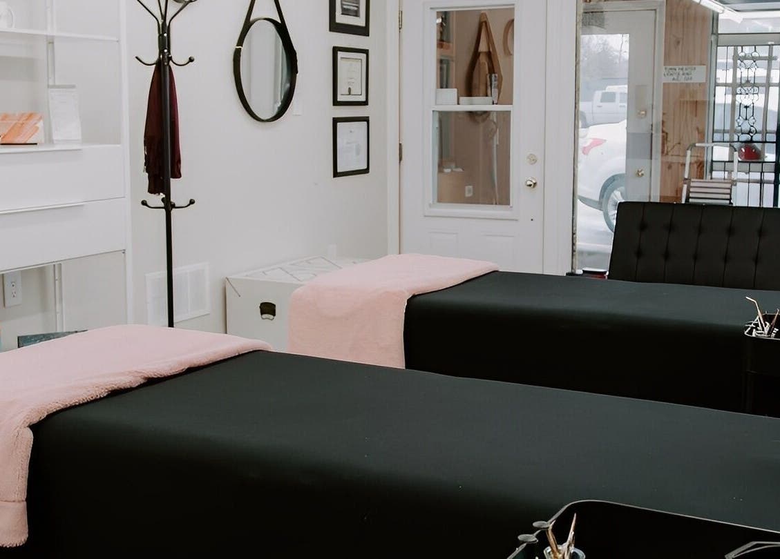 Elegant treatment room at Strathroy - Sweet as Sugar, featuring two massage tables. Strathroy, Ontario, CA.
