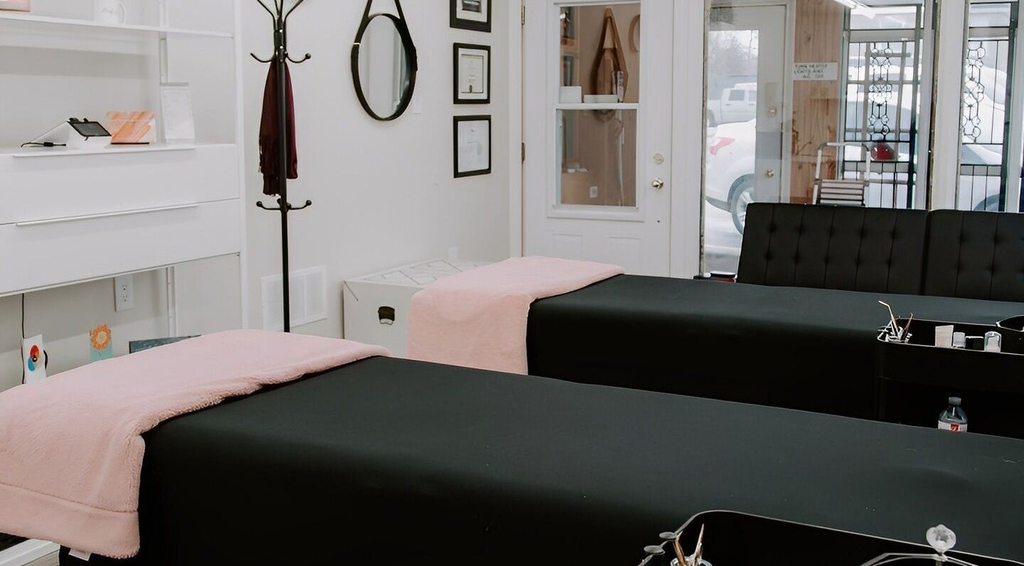 Elegant treatment room at Strathroy - Sweet as Sugar, featuring two massage tables. Strathroy, Ontario, CA.