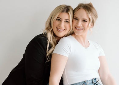 Two smiling women at Strathroy - Sweet as Sugar, Strathroy, Ontario, CA, depicting a welcoming and friendly environment.