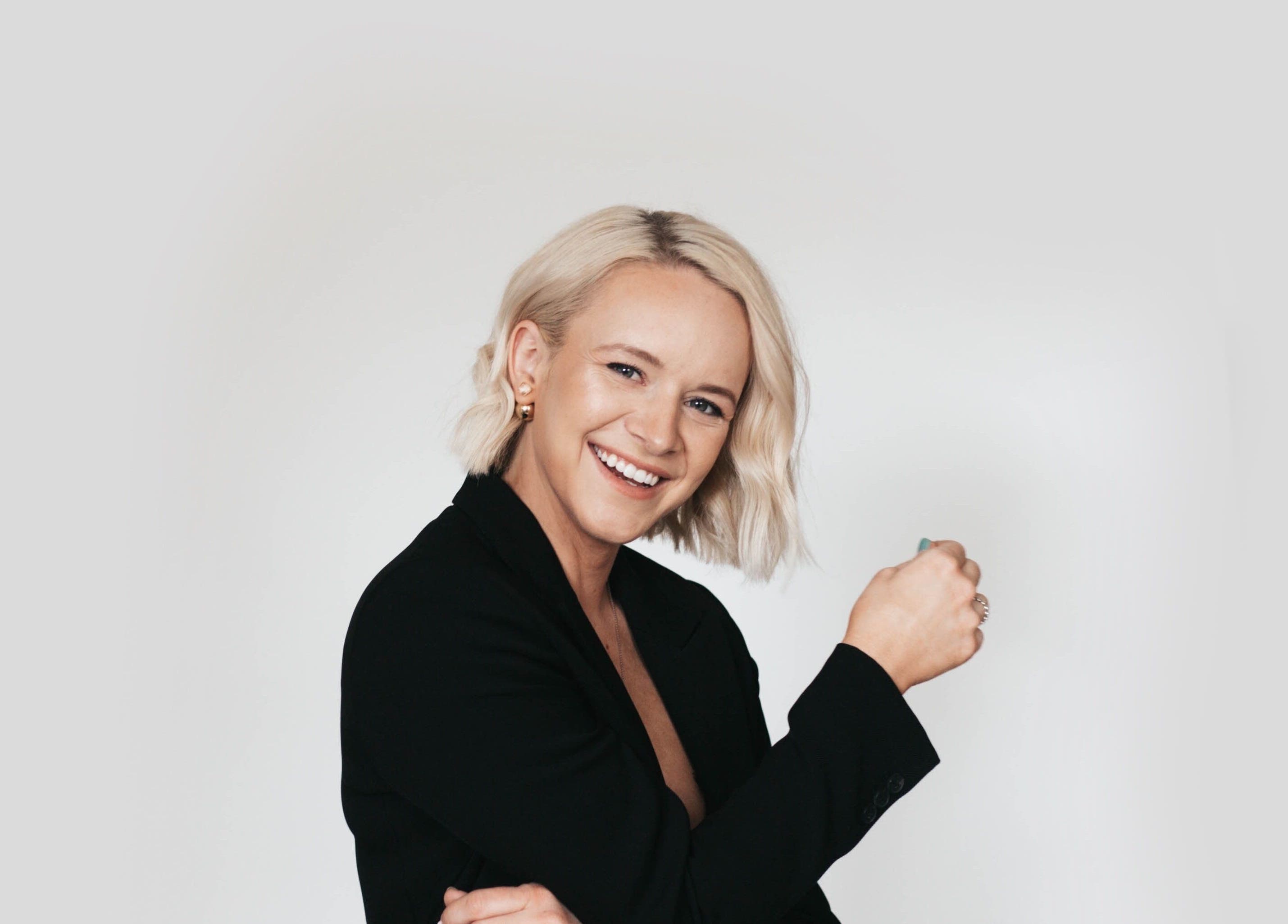 Smiling person in black blazer at Strathroy - Sweet as Sugar, Strathroy, Ontario, CA.