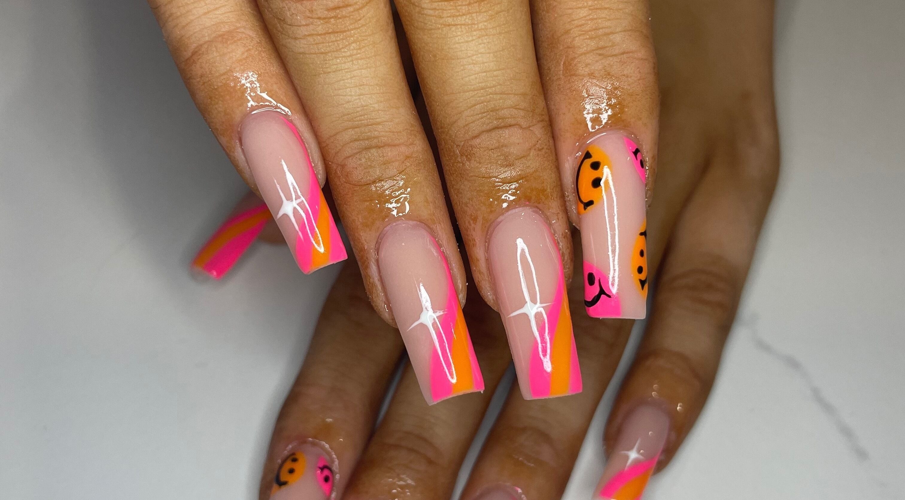 Bright neon nails with smiley designs at Nails By Jem, Yate, England, GB. Stylish and trendy manicure.
