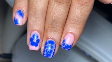 Blue floral nail art at Nails and Beauty by Sarah, Huddersfield, England, GB.
