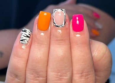 Colorful zebra nail art at Nails and Beauty by Sarah, Huddersfield, England, GB.