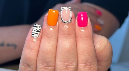 Colorful zebra nail art at Nails and Beauty by Sarah, Huddersfield, England, GB.