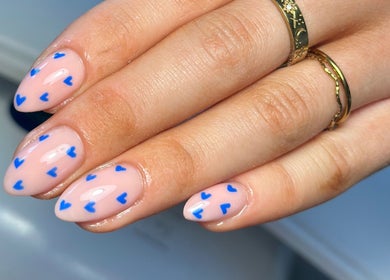 Blue heart nail art design at Nails and Beauty by Sarah, Huddersfield, England, GB.